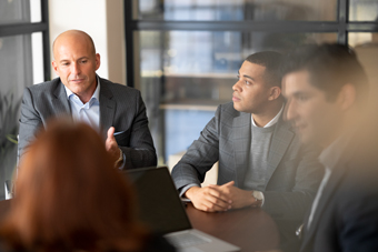 group of people meeting in a conference room